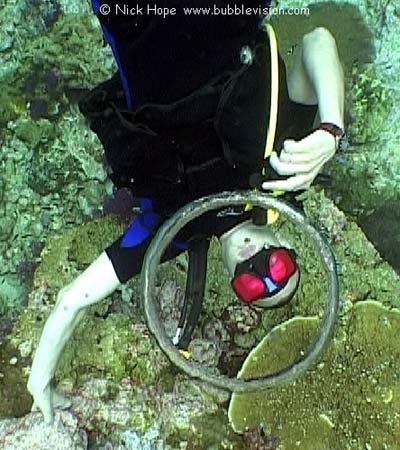scuba diver blowing bubble ring