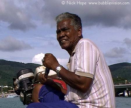 Thai longtail boat driver